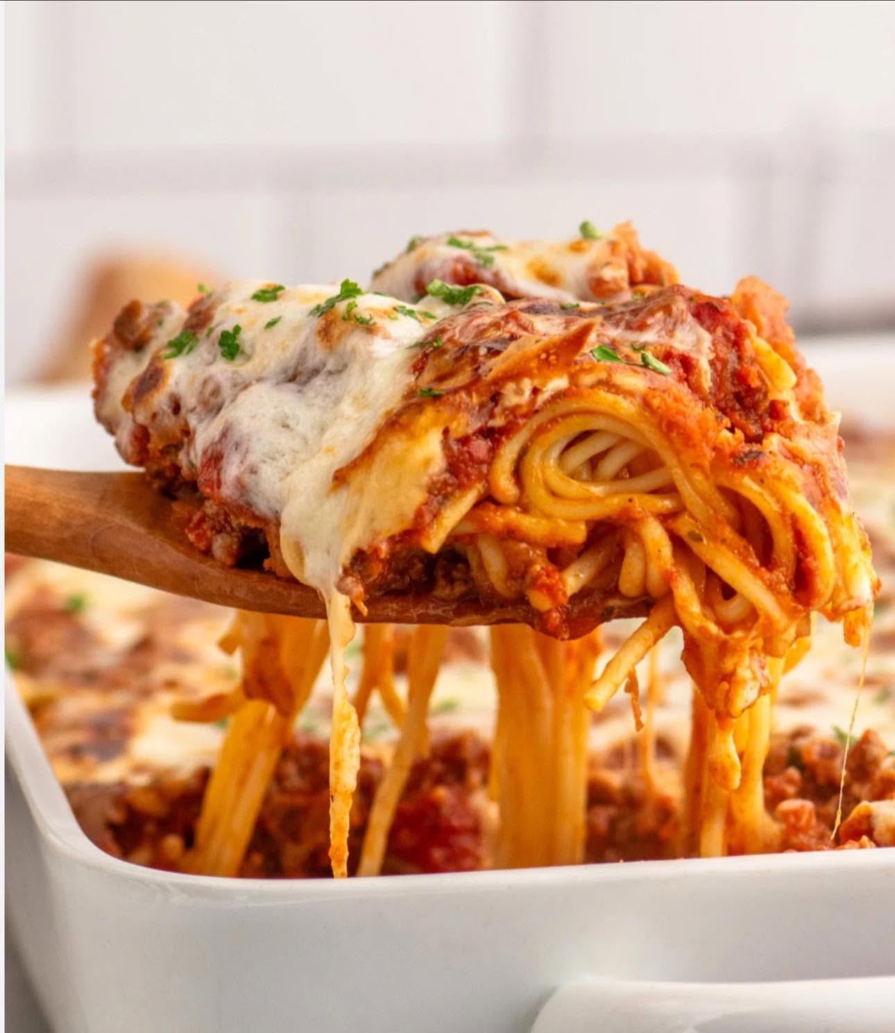 A baked pasta dish prepared for a Friday night community meal